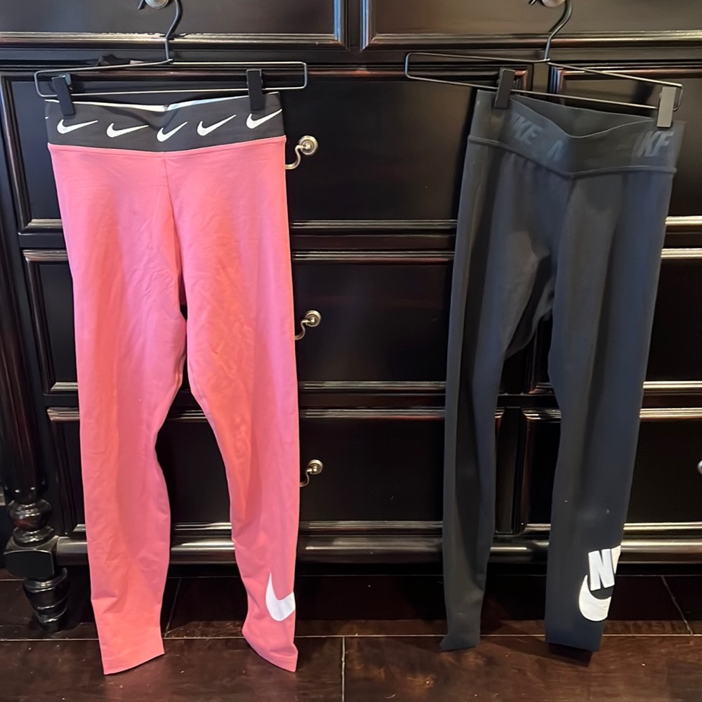 Nike bundle pink is new size small black is xs worn 2 times